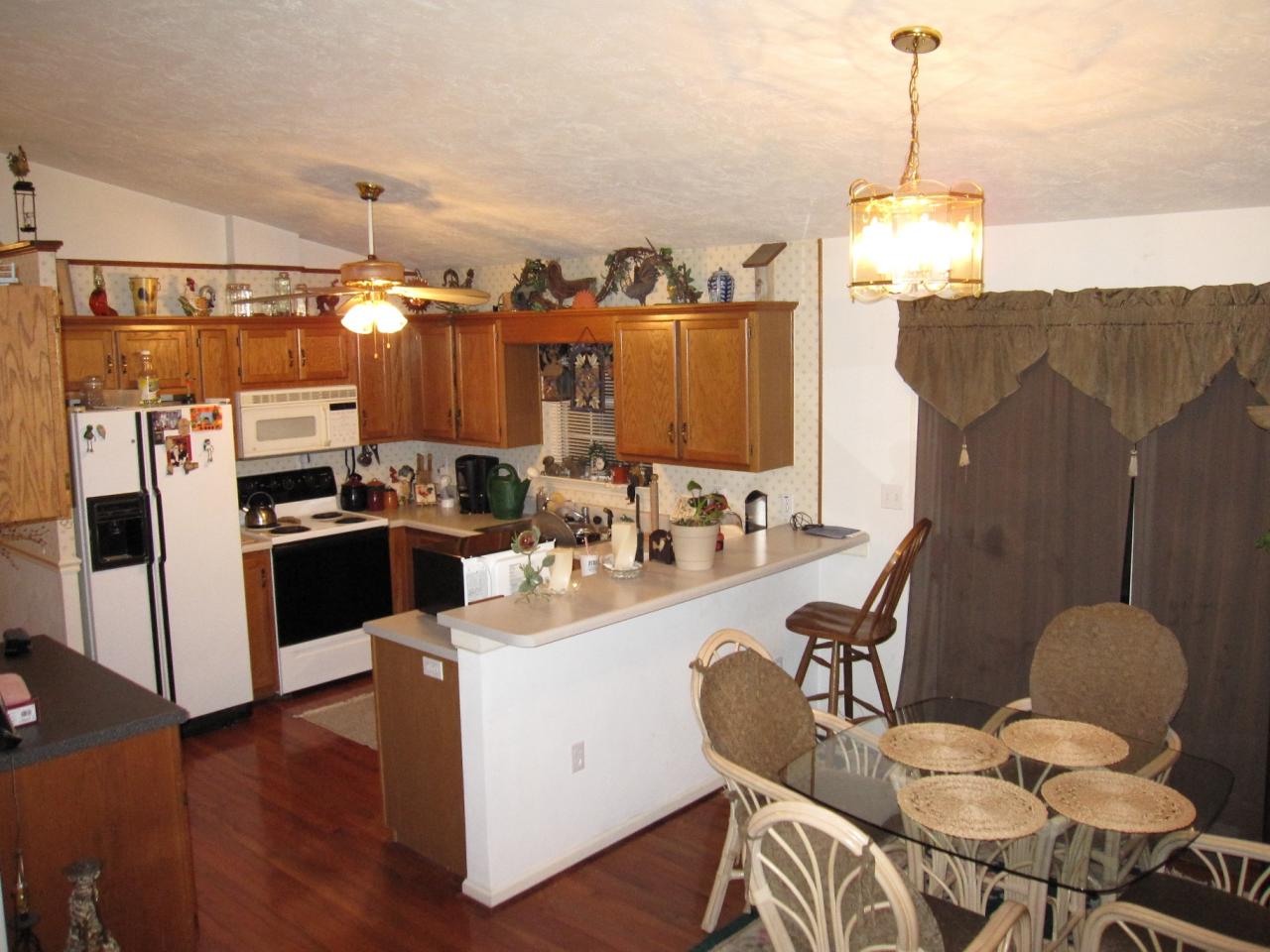 2169 Deep Woods Road Hardy, VA 24101 - Photo 32 of 37 a kitchen with a sink appliances and cabinets
