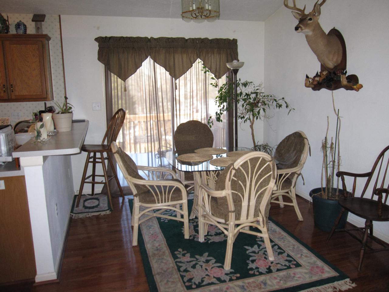 2169 Deep Woods Road Hardy, VA 24101 - Photo 6 of 37 a view of a dining room with furniture and wooden floor