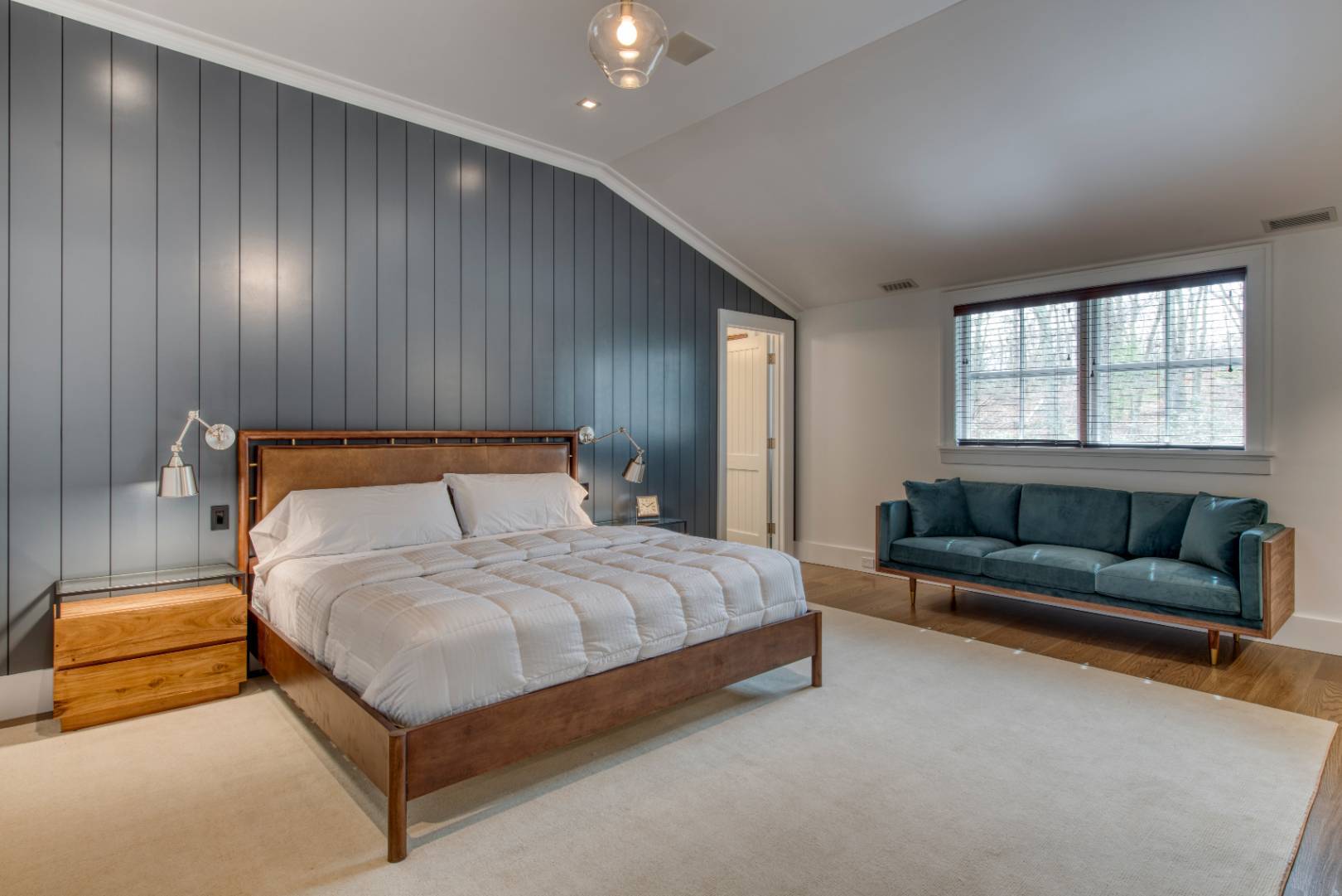 178 Bull Path East Hampton, NY 11937 - Photo 13 of 25 a bedroom with a bed couch and windows