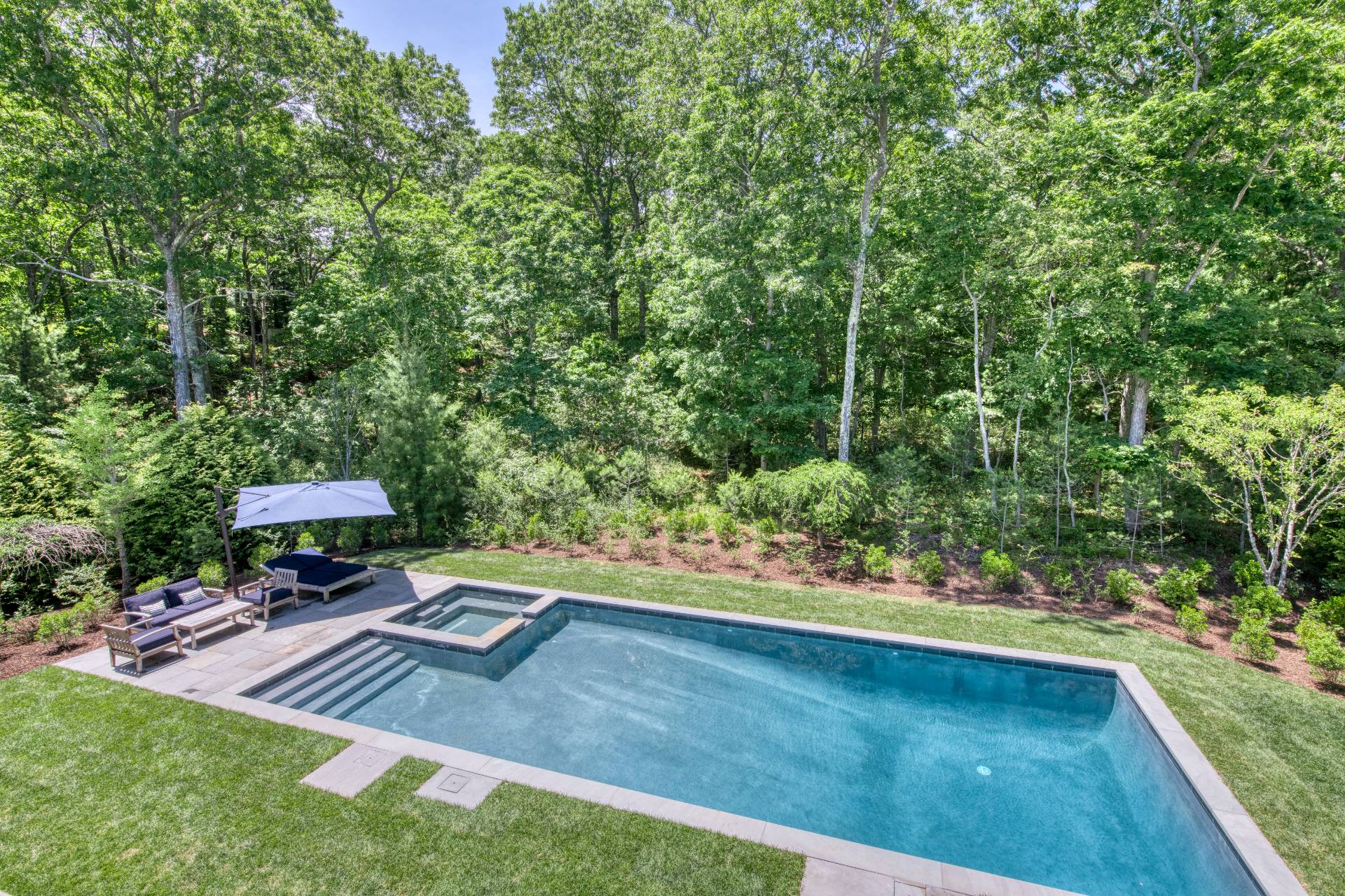 178 Bull Path East Hampton, NY 11937 - Photo 23 of 25 a view of a backyard with sitting area