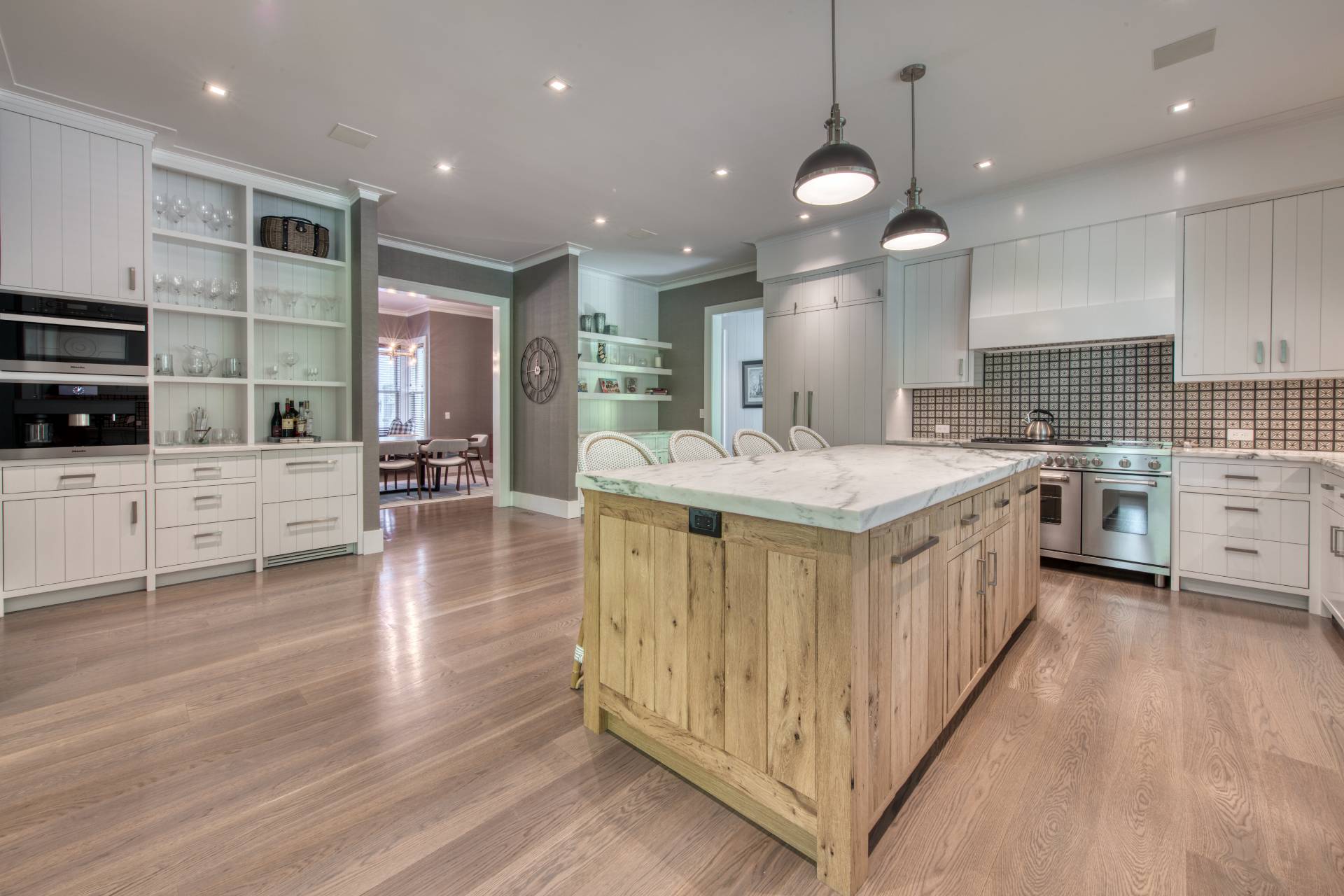 178 Bull Path East Hampton, NY 11937 - Photo 5 of 25 a large white kitchen with lots of counter space