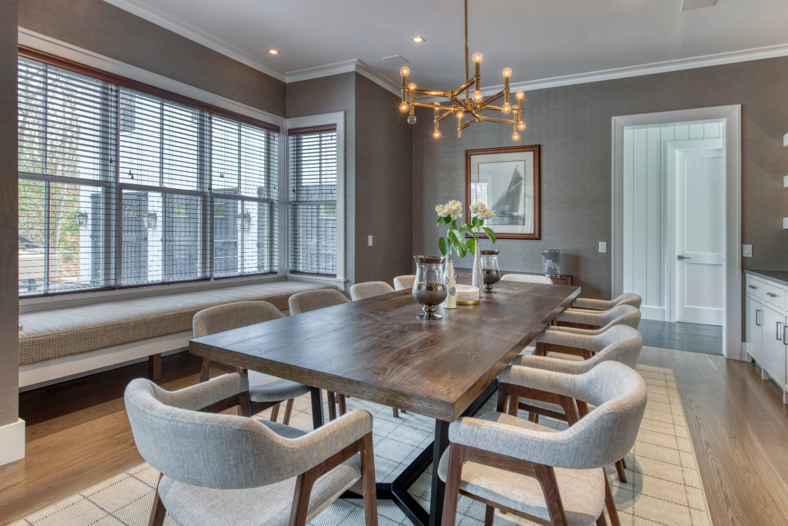 178 Bull Path East Hampton, NY 11937 - Photo 6 of 25 a view of a dining room with furniture wooden floor and chandelier