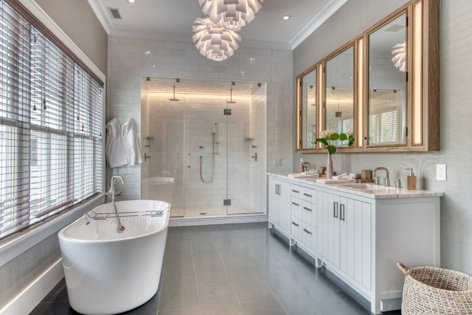 178 Bull Path East Hampton, NY 11937 - Photo 8 of 25 a bathroom with a bathtub shower sink and mirror