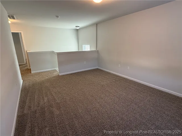 an empty room with an entryway