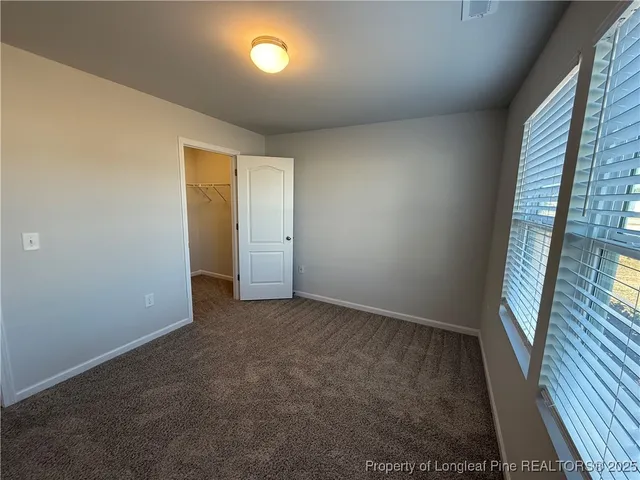 a bathroom with a toilet a sink and bathtub