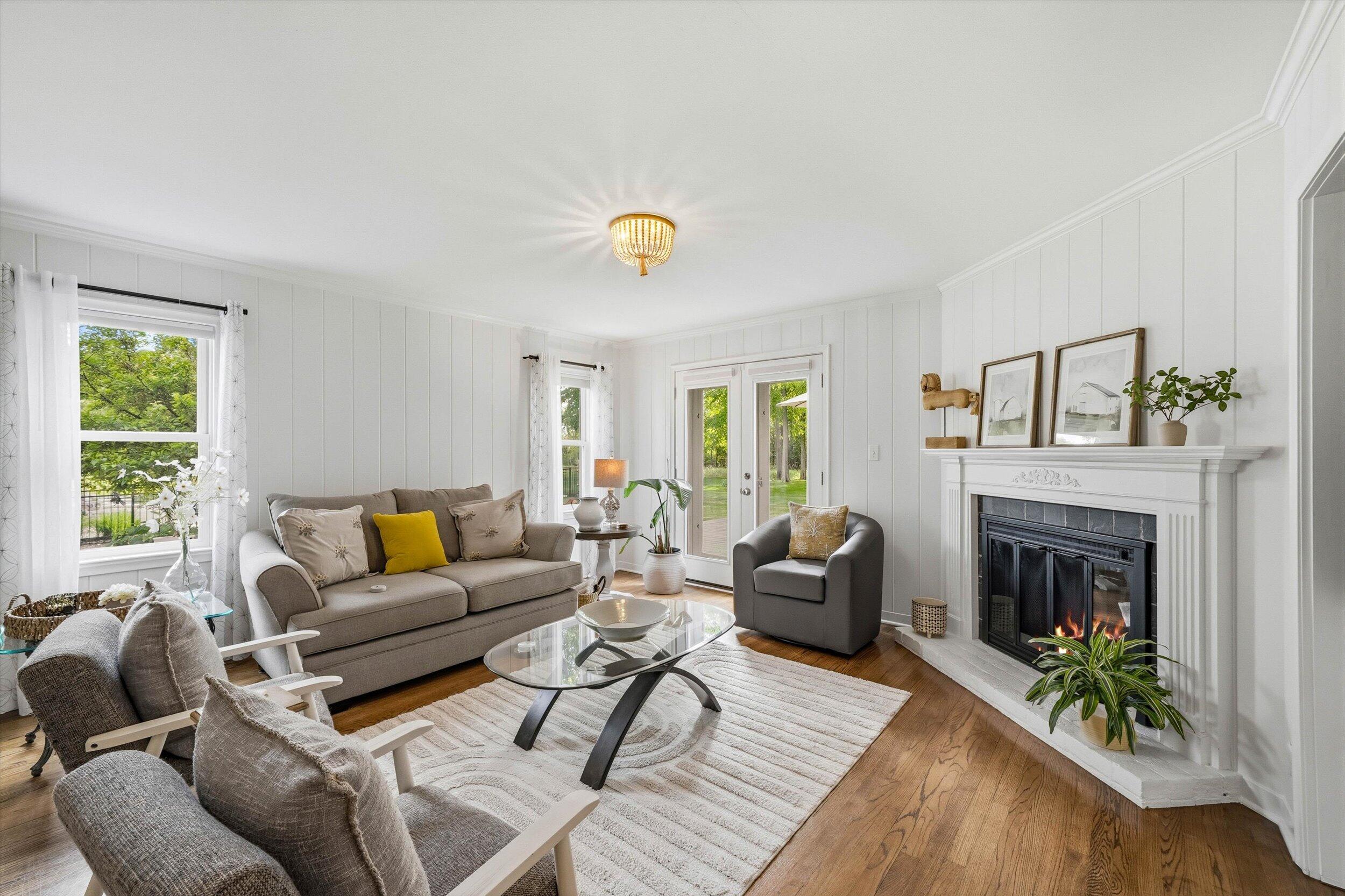 9431 Hawthorne Road Mequon, WI 53097 - Photo 15 of 67 Family room w/ French doors to deck