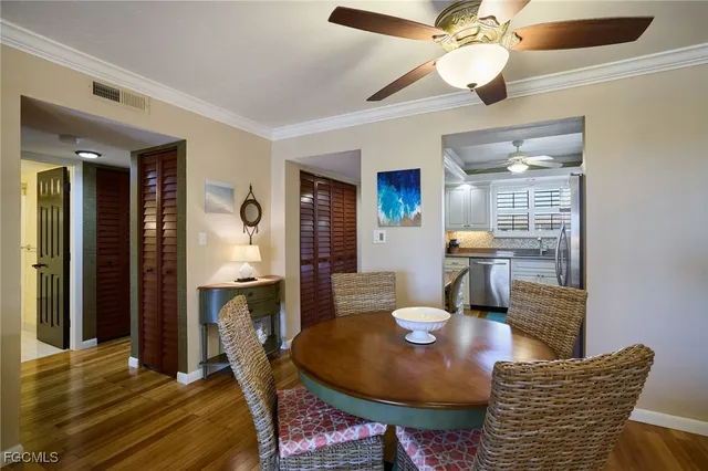 a view of a dining room with furniture