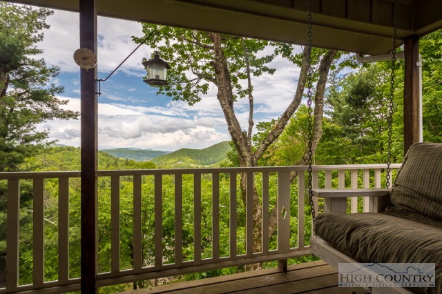 1115 Deck Hill Road Boone, NC 28607 - Photo 23 of 35 a view of balcony with furniture