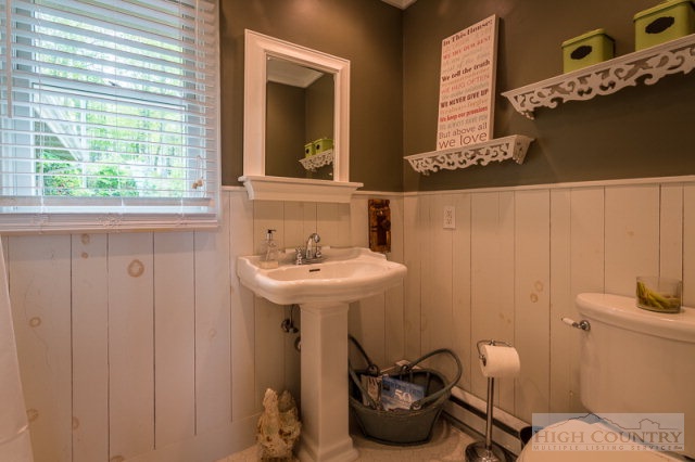 1115 Deck Hill Road Boone, NC 28607 - Photo 24 of 35 a bathroom with a sink and a toilet