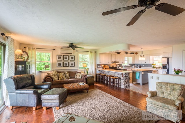 1115 Deck Hill Road Boone, NC 28607 - Photo 35 of 35 a living room with furniture and a large window