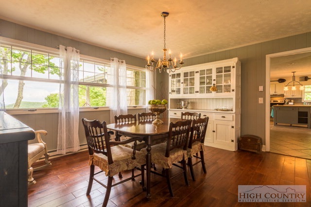 1115 Deck Hill Road Boone, NC 28607 - Photo 4 of 35 a view of a dining room with furniture window and wooden floor