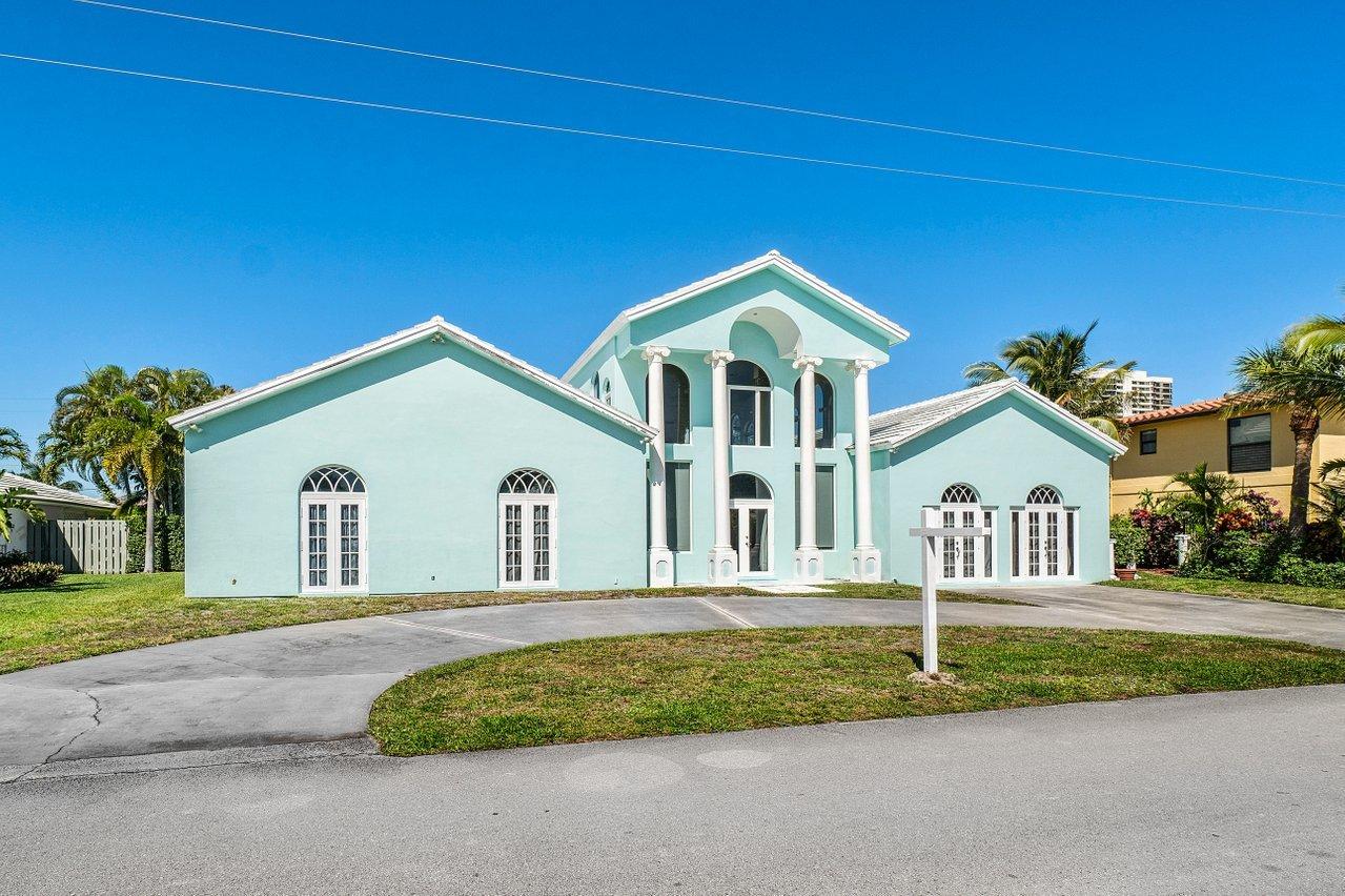 1230 Dolphin Road Singer Island, FL 33404 - Photo 2 of 40 FRONT