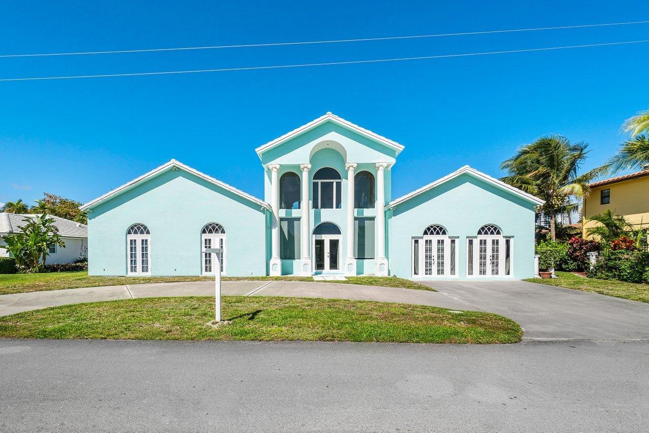 1230 Dolphin Road Singer Island, FL 33404 - Photo 3 of 40 FRONT