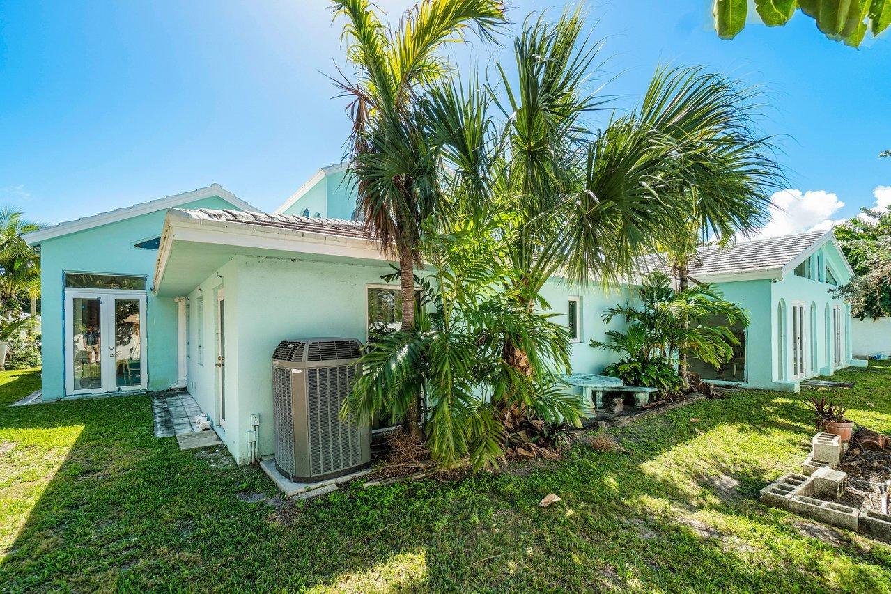 1230 Dolphin Road Singer Island, FL 33404 - Photo 40 of 40 REAR AND SIDE YARDS