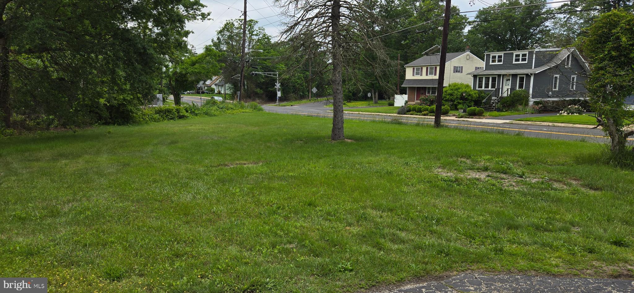 212 New Albany Road Moorestown, NJ 08057 - Photo 3 of 3 a view of a big house with a big yard and large trees