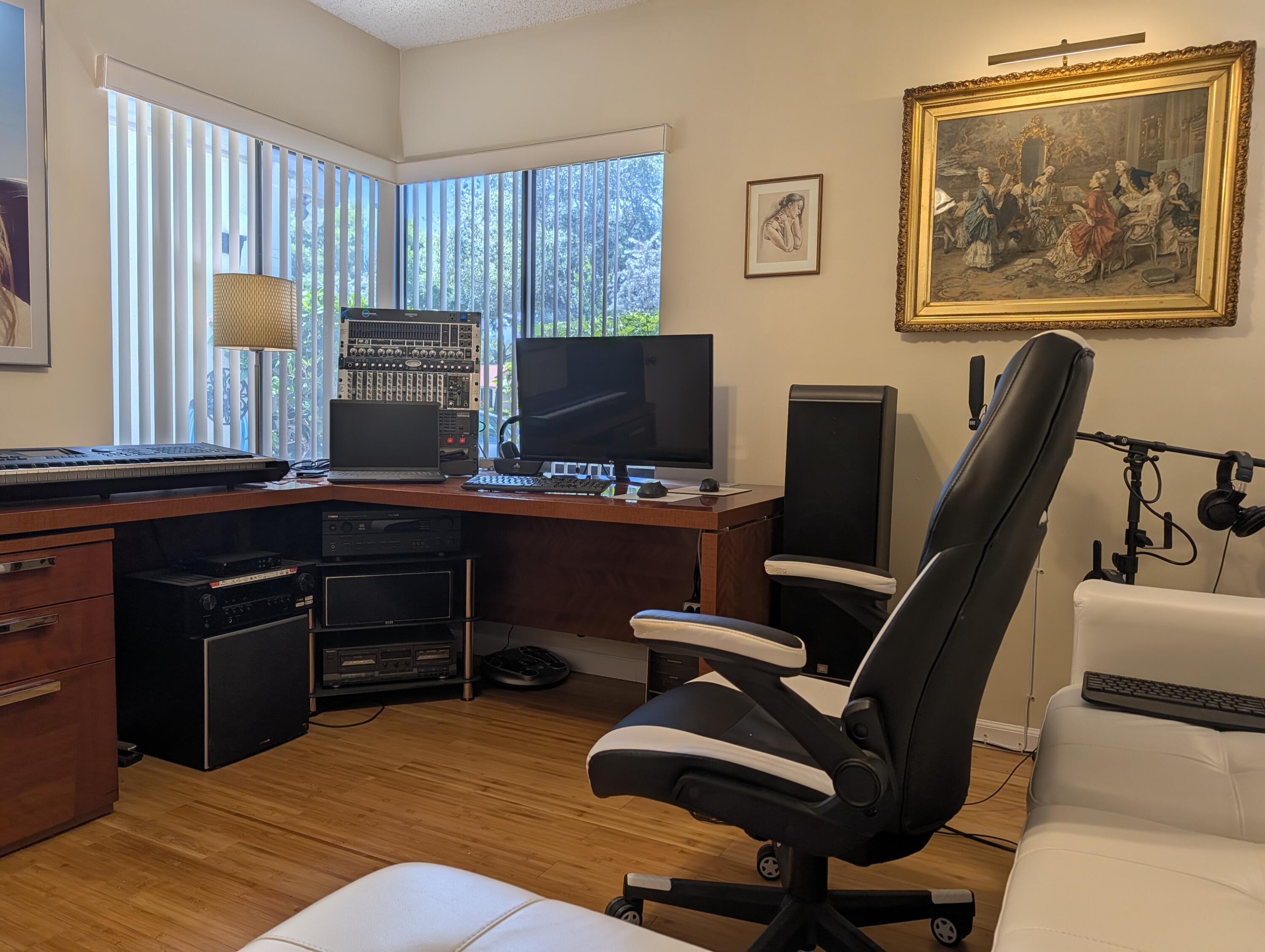 8246 Springview Terrace Boca Raton, FL 33496 - Photo 28 of 53 a view of a workspace with furniture and a window
