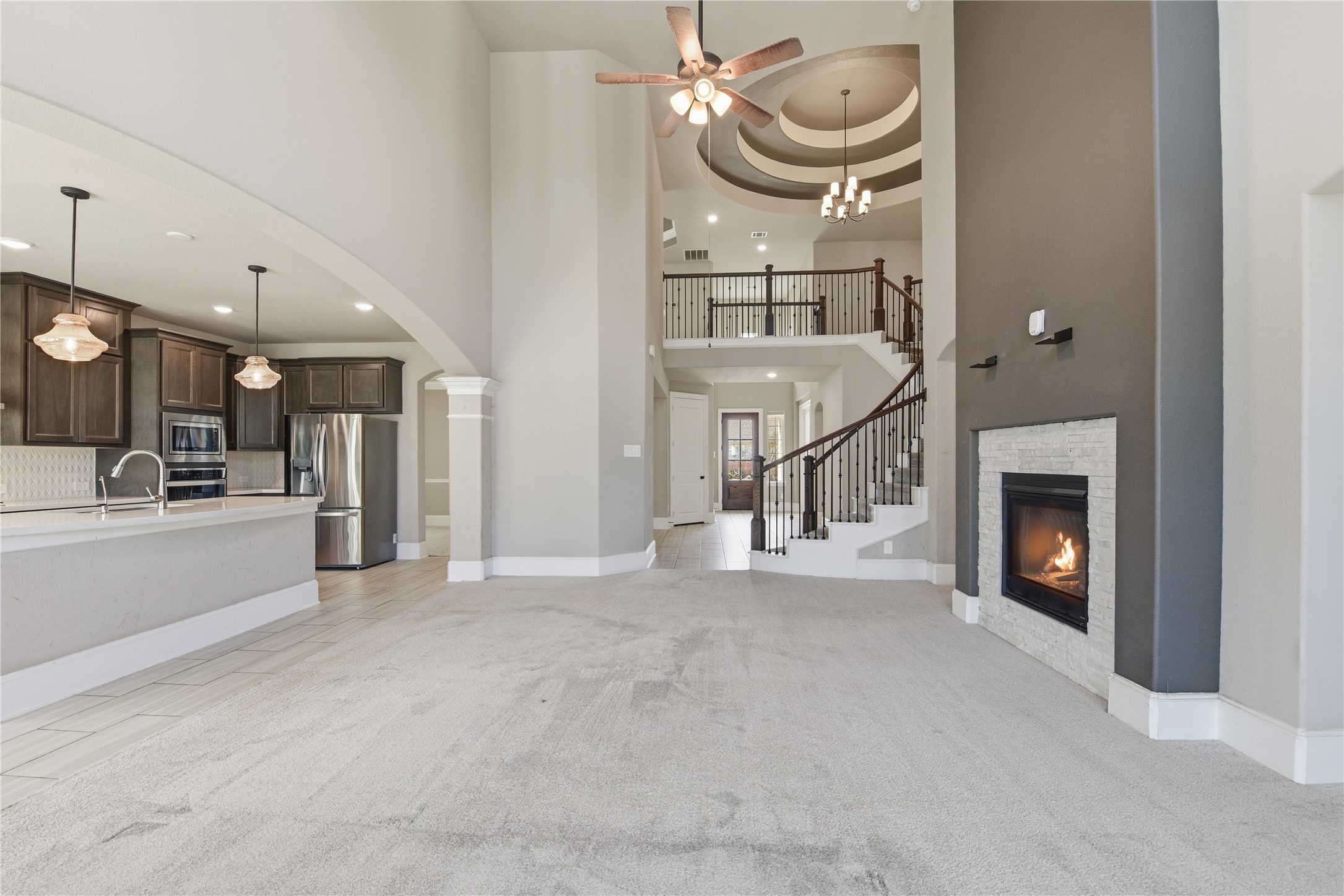 17501 Spice Merlot Lane Conroe, TX 77302 - Photo 16 of 50 a view of a livingroom with a fireplace
