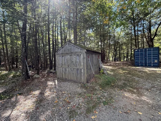 a view of backyard with green space