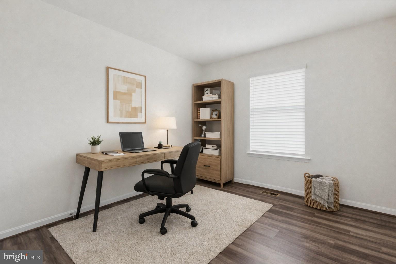7831 Wolf Run Lane Severn, MD 21144 - Photo 19 of 30 a view of a workspace with furniture and a window
