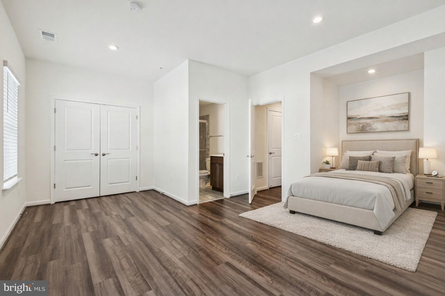 7831 Wolf Run Lane Severn, MD 21144 - Photo 28 of 30 a view of a bedroom with wooden floor and window