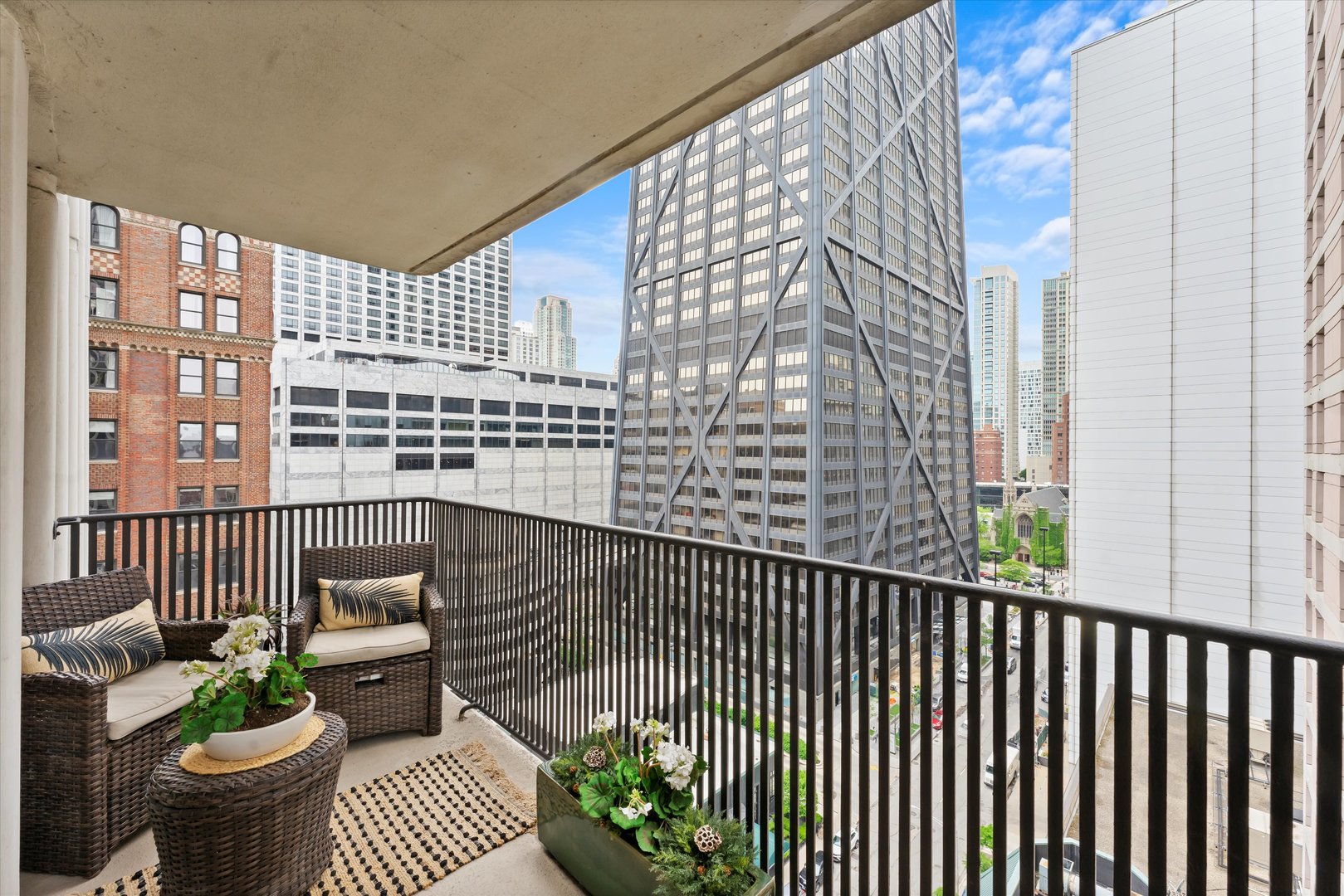 200 East Delaware Place, Unit 15F Chicago, IL 60611 - Photo 18 of 27 a view of a balcony with chair