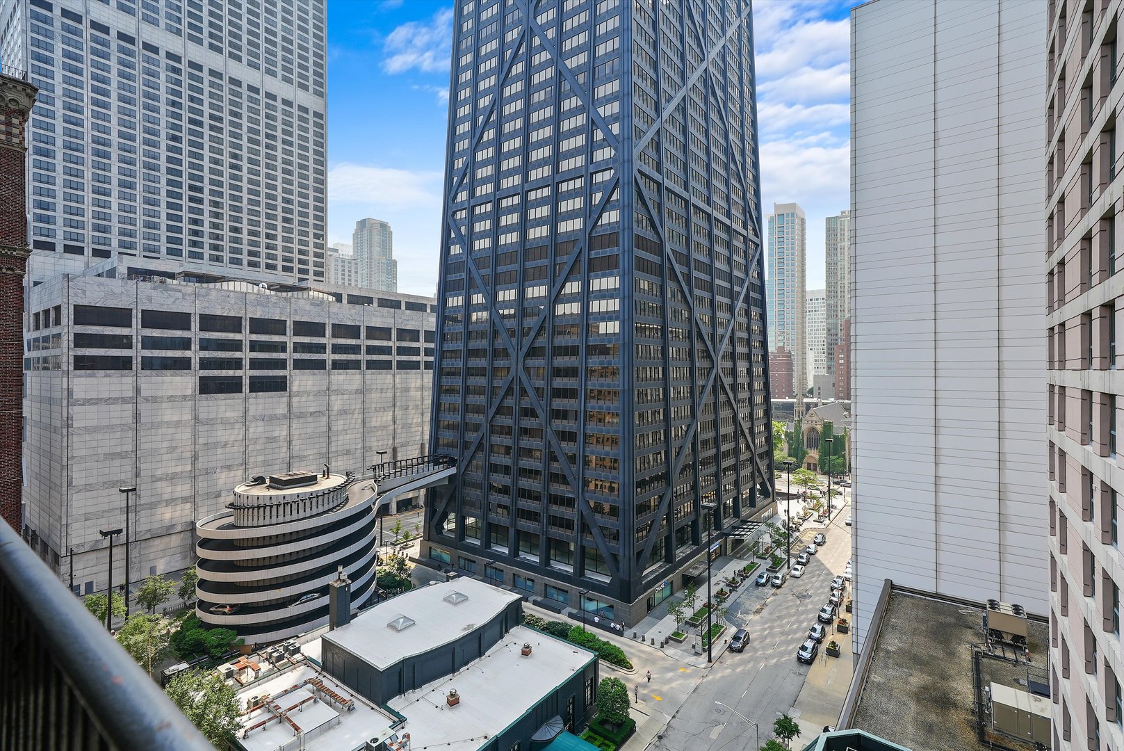 200 East Delaware Place, Unit 15F Chicago, IL 60611 - Photo 19 of 27 a front view of a building with outdoor seating