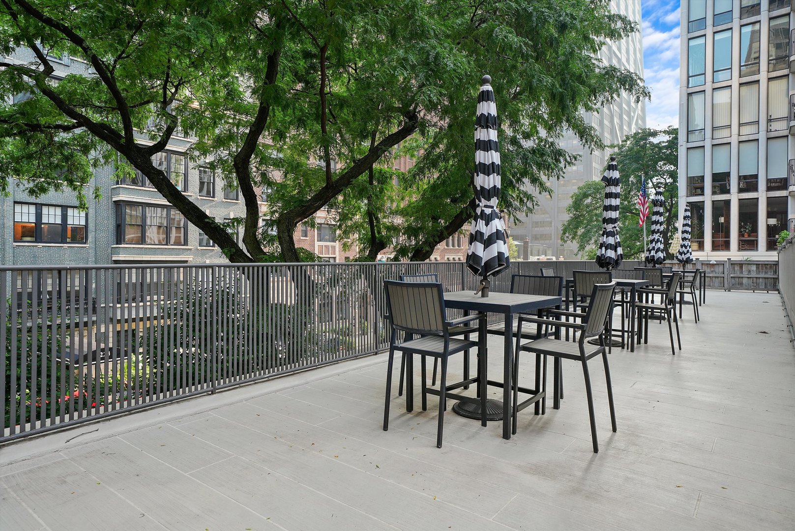 200 East Delaware Place, Unit 15F Chicago, IL 60611 - Photo 23 of 27 a view of a house with a table and chairs