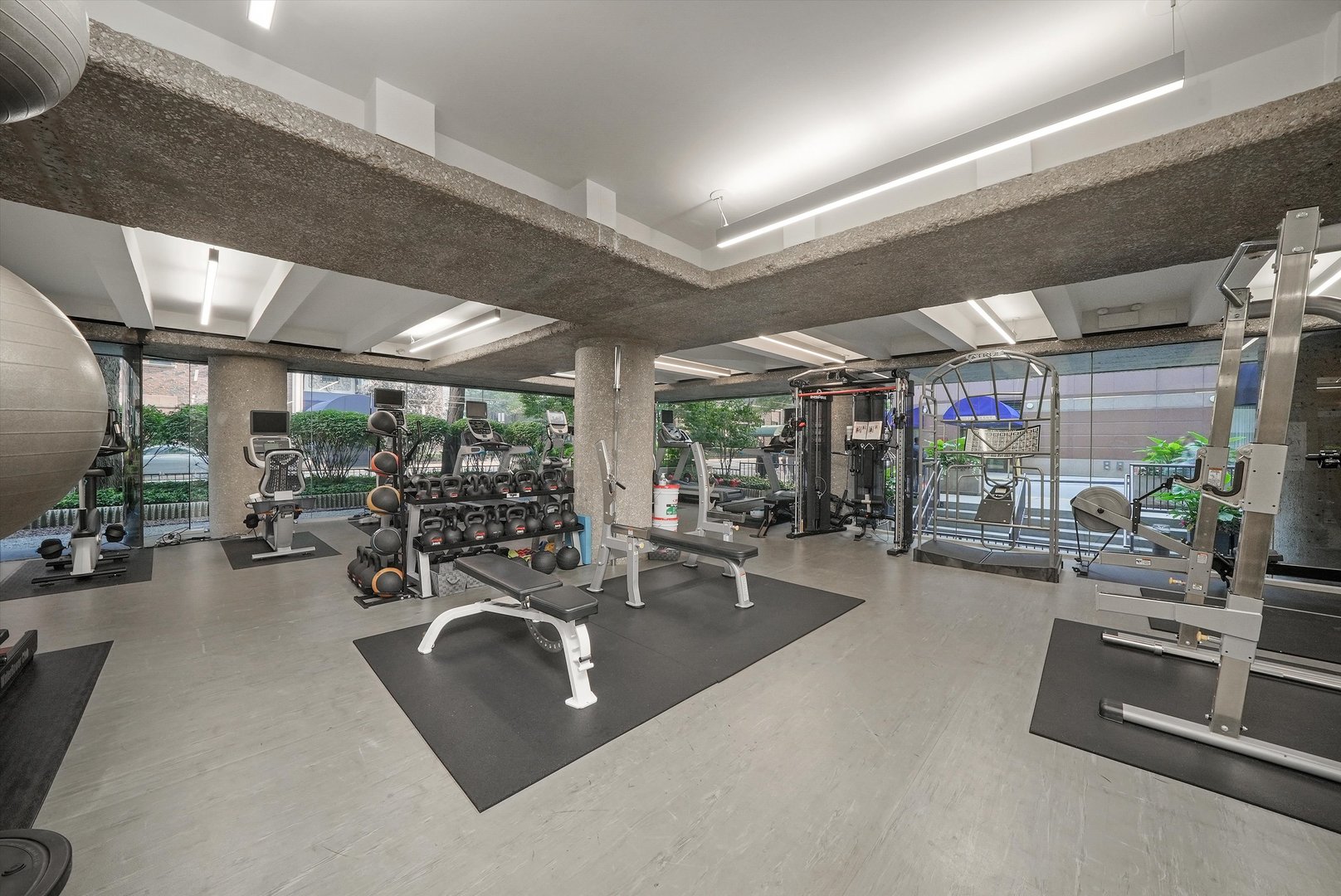 200 East Delaware Place, Unit 15F Chicago, IL 60611 - Photo 24 of 27 a view of a room with gym equipment