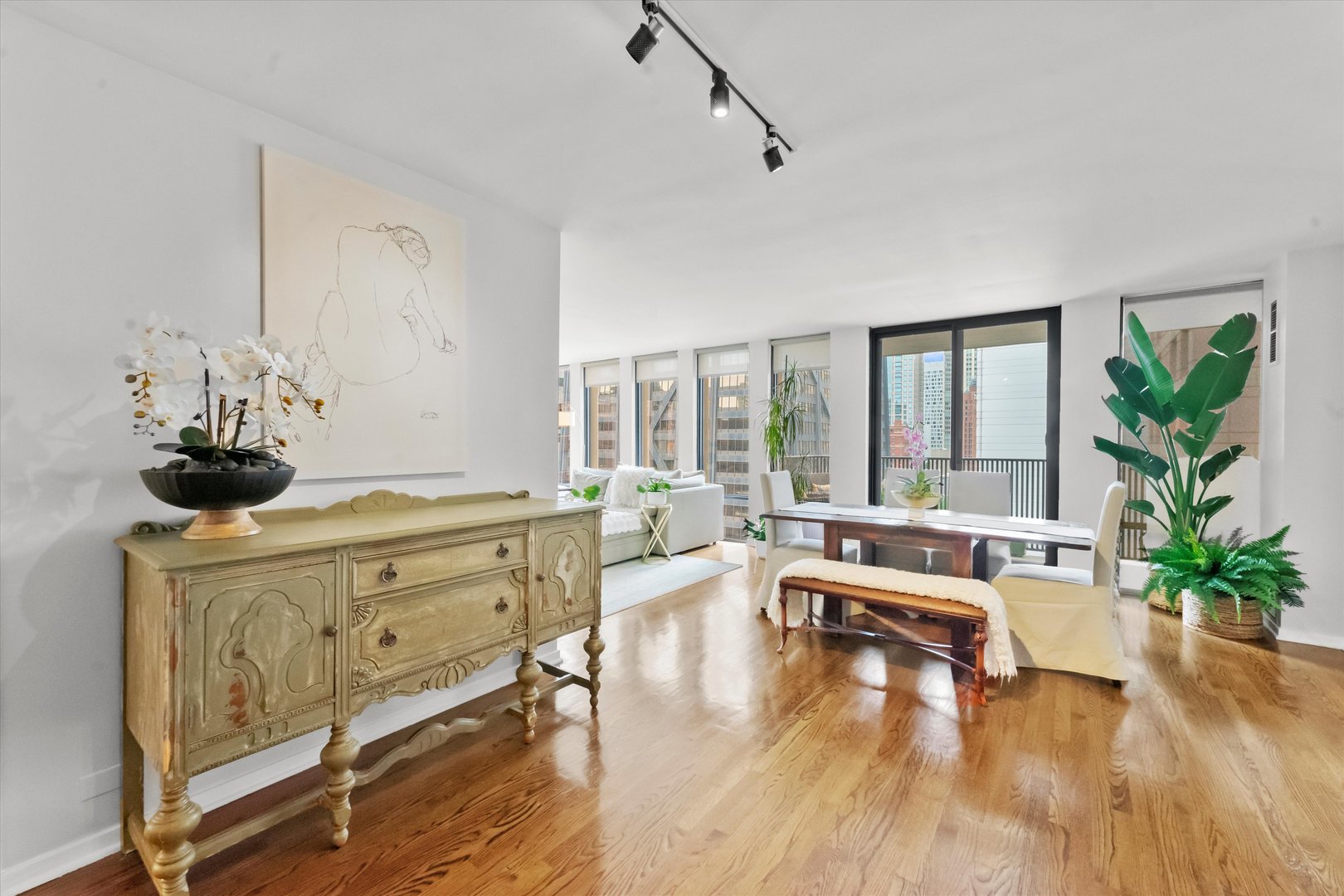 200 East Delaware Place, Unit 15F Chicago, IL 60611 - Photo 5 of 27 a living room with furniture and a large window
