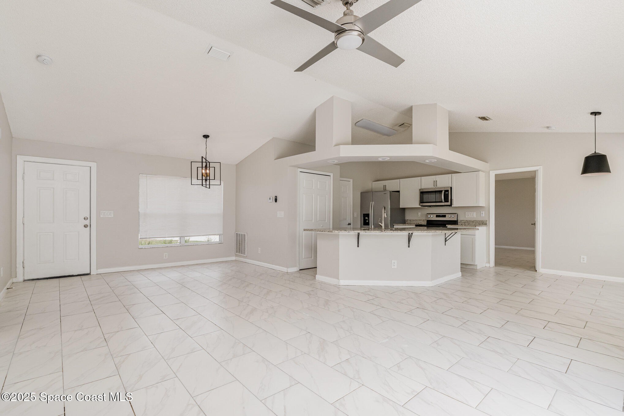 2208 Ravel Road Southeast Palm Bay, FL 32909 - Photo 8 of 27 009_file_648