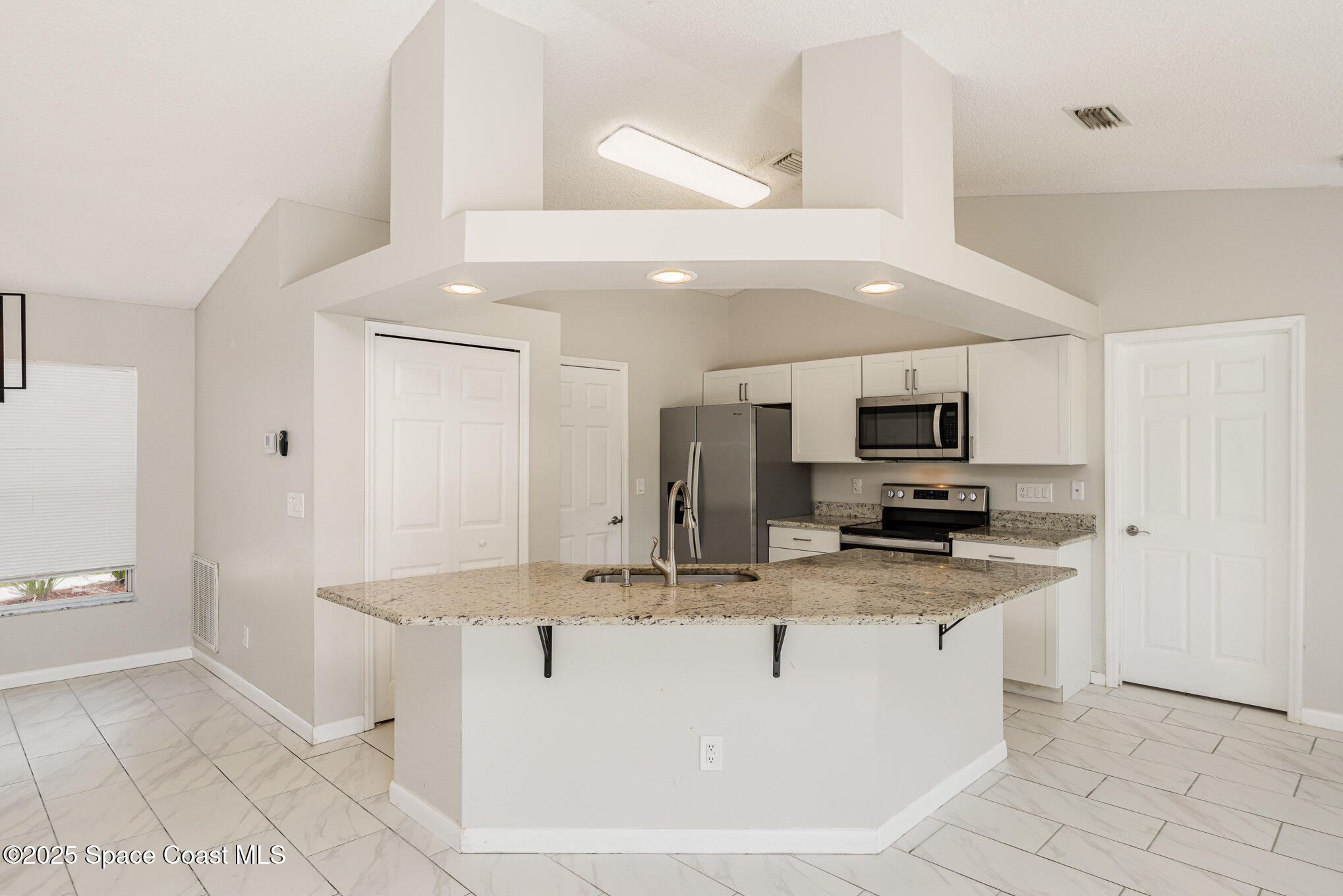 2208 Ravel Road Southeast Palm Bay, FL 32909 - Photo 10 of 27 011_file_21