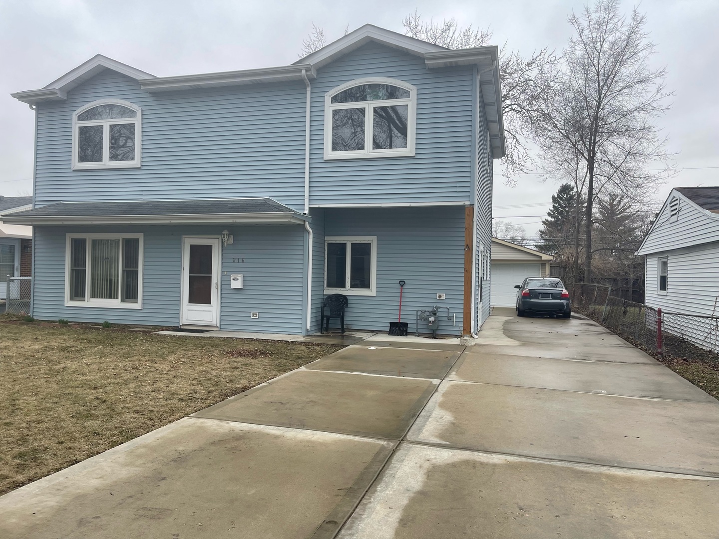 216 West Wayne Place Wheeling, IL 60090 - Photo 2 of 12 a house view with a outdoor space