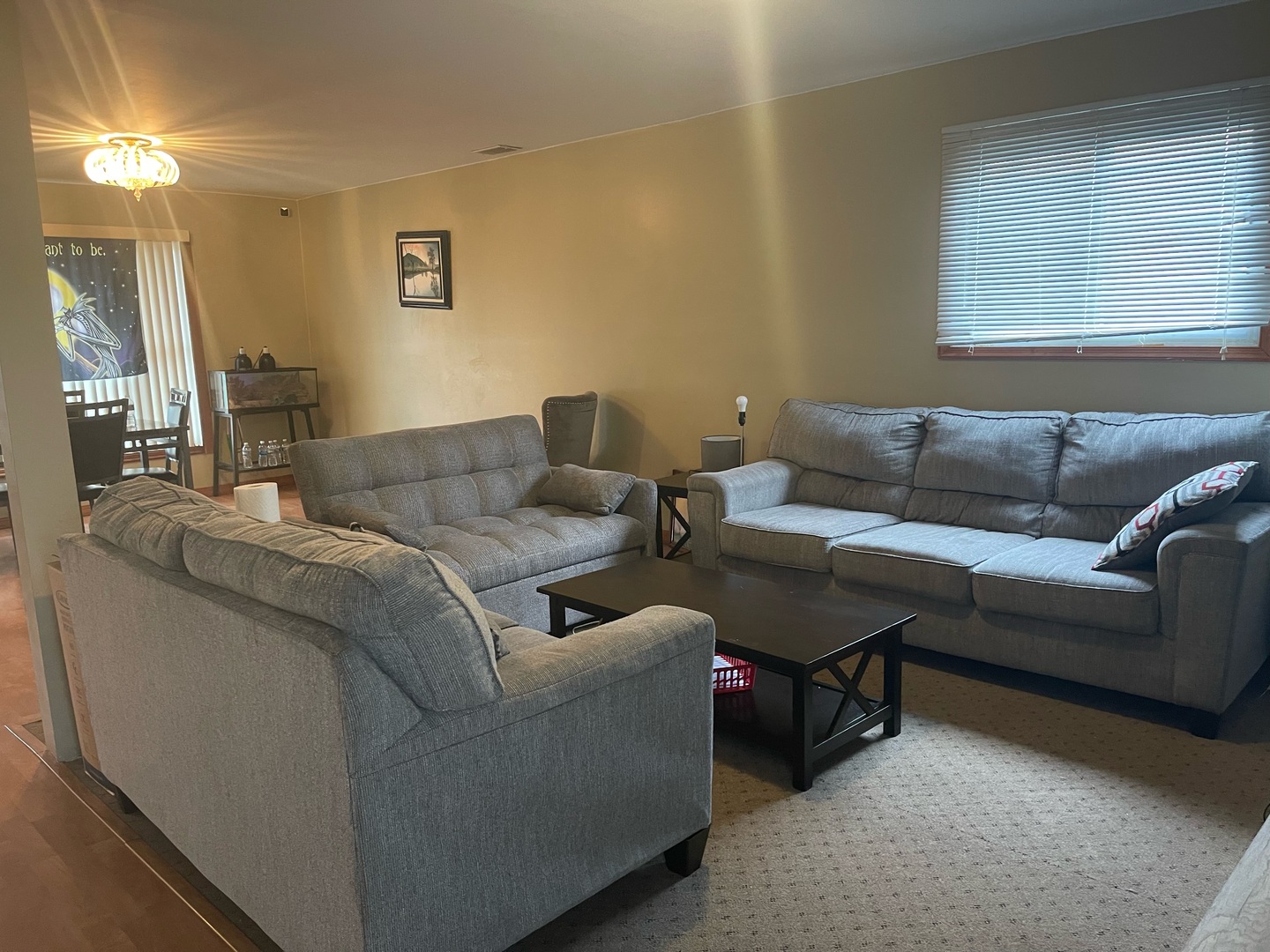 216 West Wayne Place Wheeling, IL 60090 - Photo 3 of 12 a living room with furniture and a couch