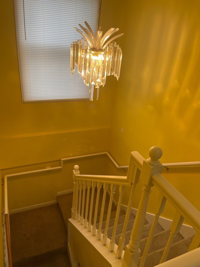 216 West Wayne Place Wheeling, IL 60090 - Photo 6 of 12 a bathroom with a sink and a mirror