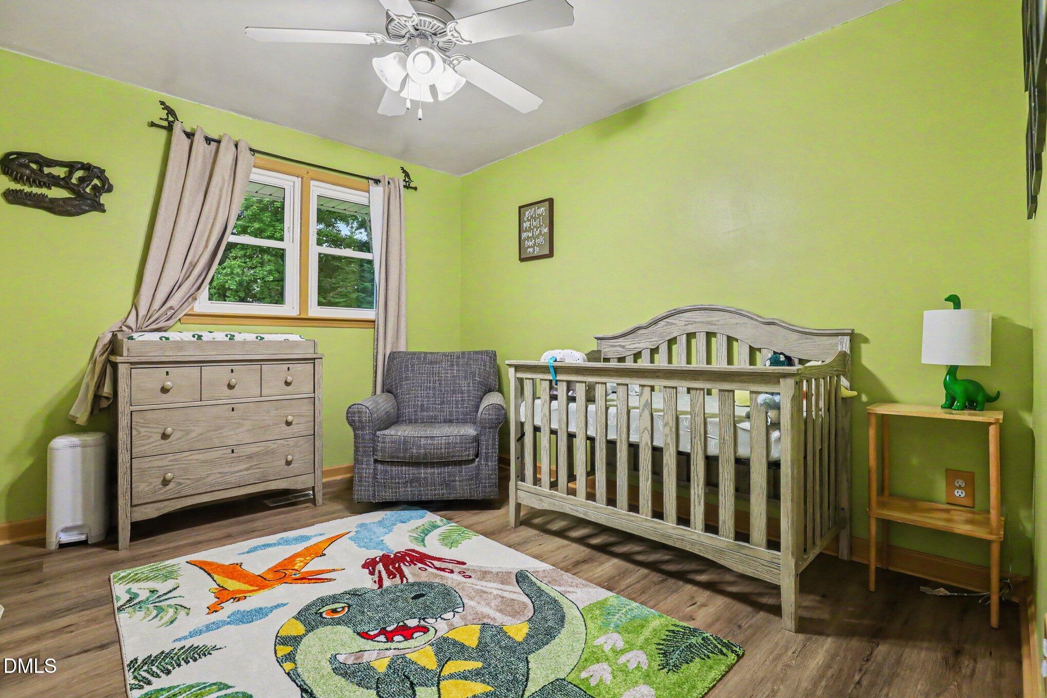 977 Stevens Mill Road Goldsboro, NC 27530 - Photo 26 of 31 a bedroom with a bed and a window