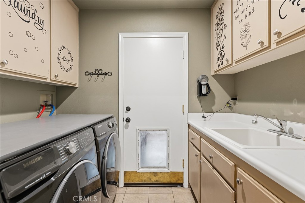 25613 Shaw Place Stevenson Ranch, CA 91381 - Photo 37 of 66 Downstairs Laundry room