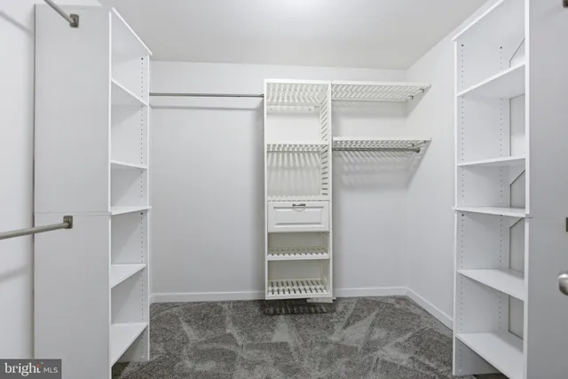 a view of an empty walk in closet