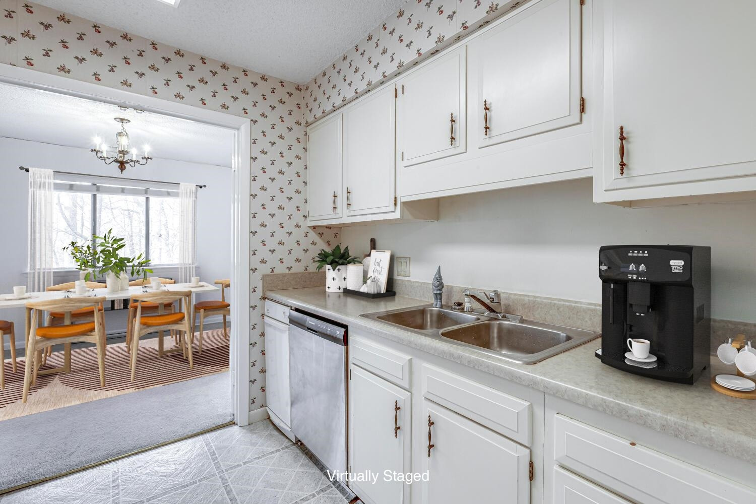 3086 Colony Road, Unit E Durham, NC 27705 - Photo 5 of 30 a kitchen with white cabinets and sink