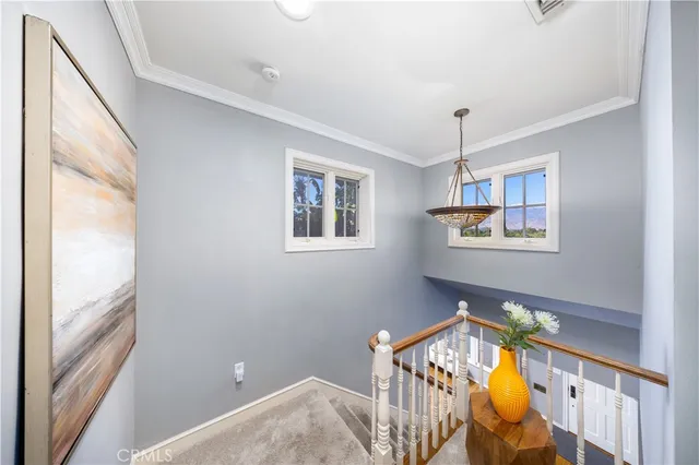 a bedroom with bed and a window