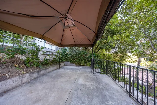 front view of a house with a large window