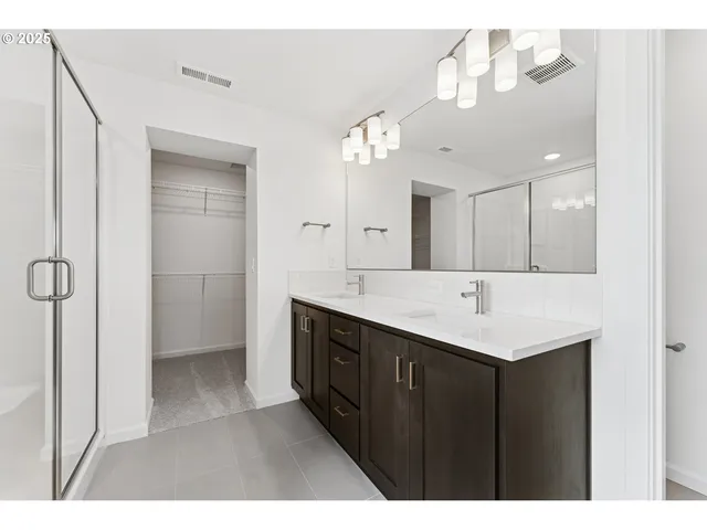 a kitchen with a sink and refrigerator