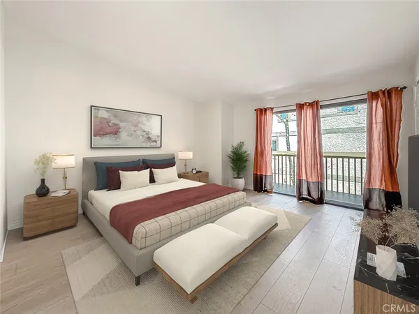 an empty room with wooden floor and window