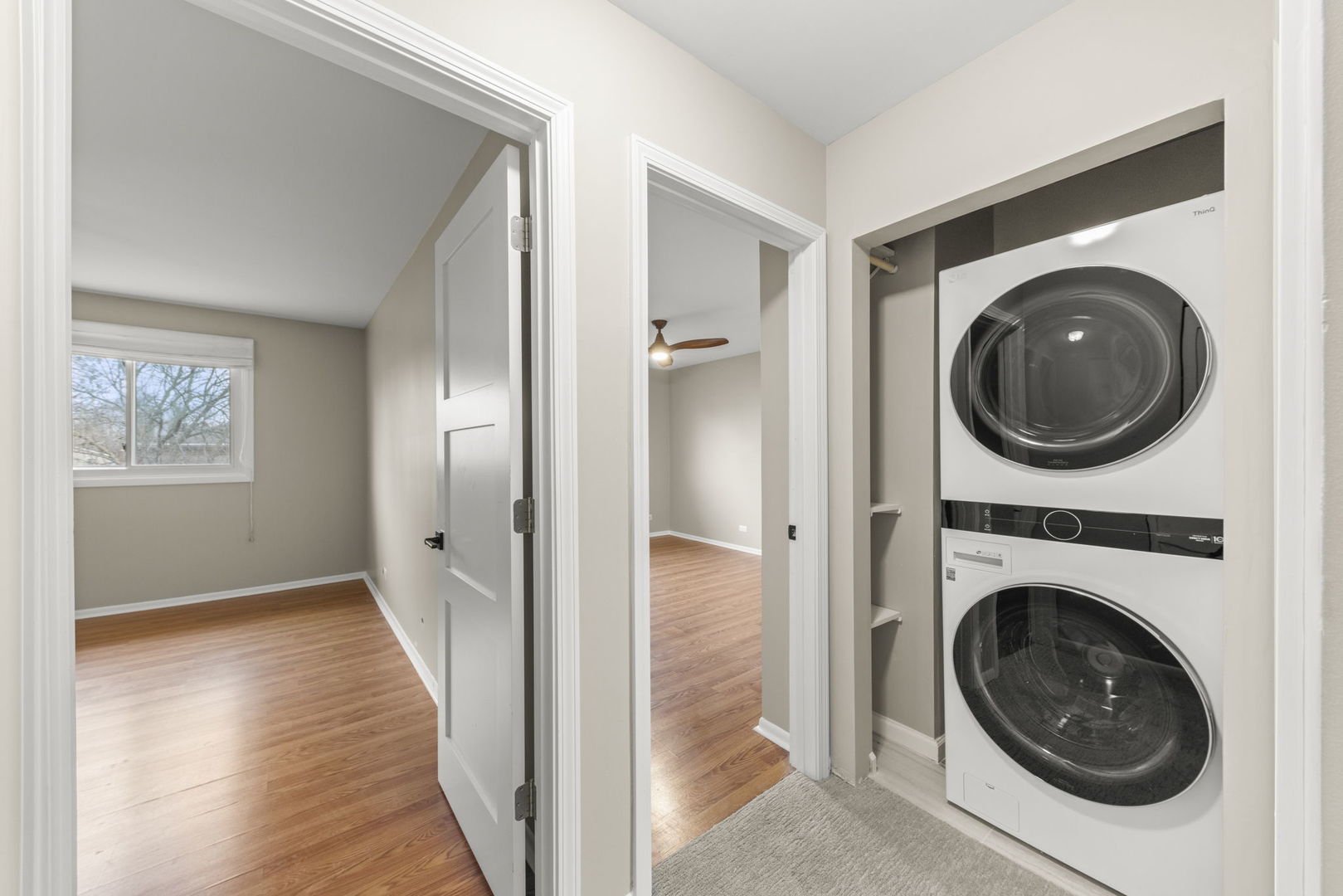 1263 Exeter Court Wheaton, IL 60189 - Photo 18 of 25 a view of a hallway with washer and dryer