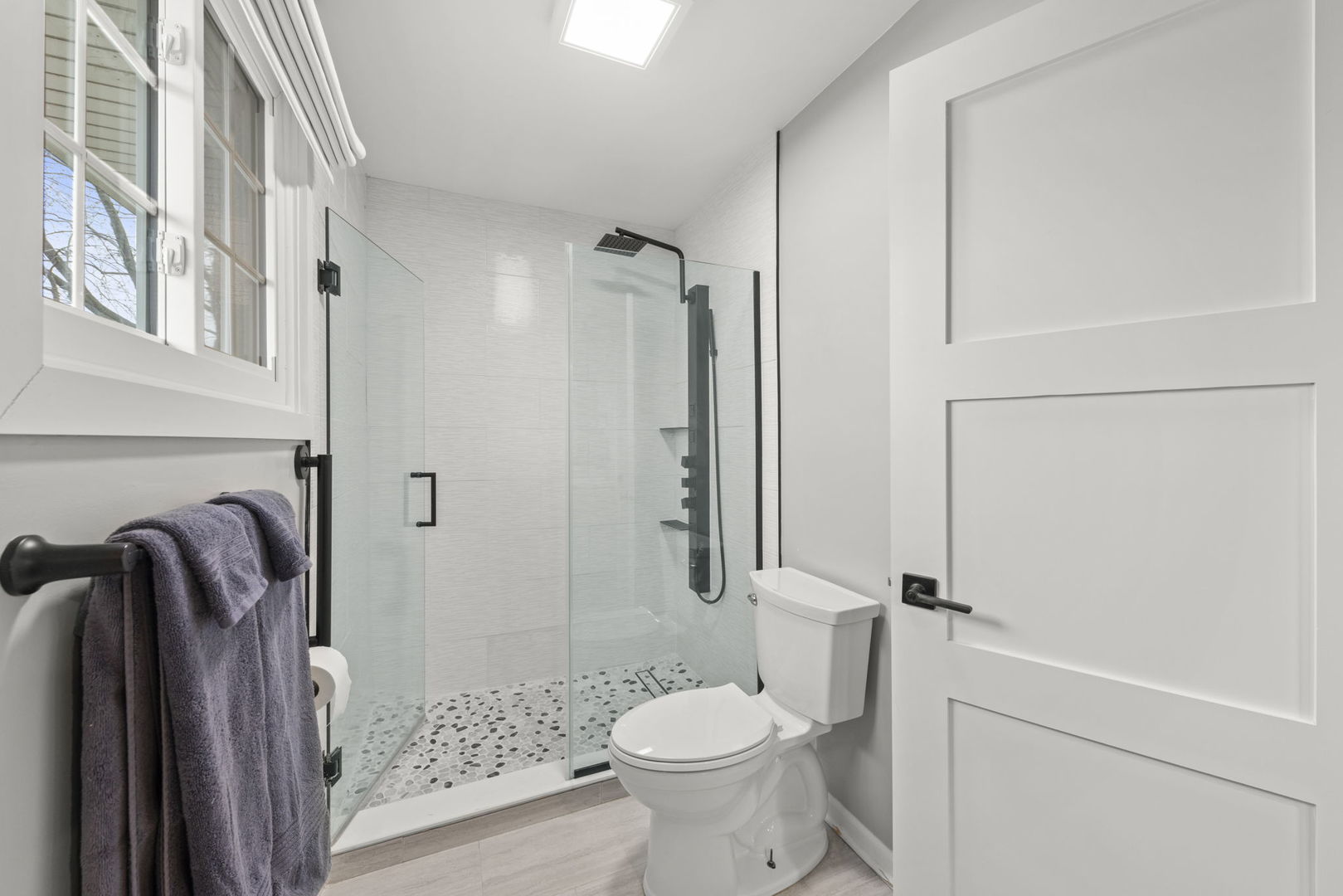 1263 Exeter Court Wheaton, IL 60189 - Photo 20 of 25 a bathroom with a shower a toilet and a sink