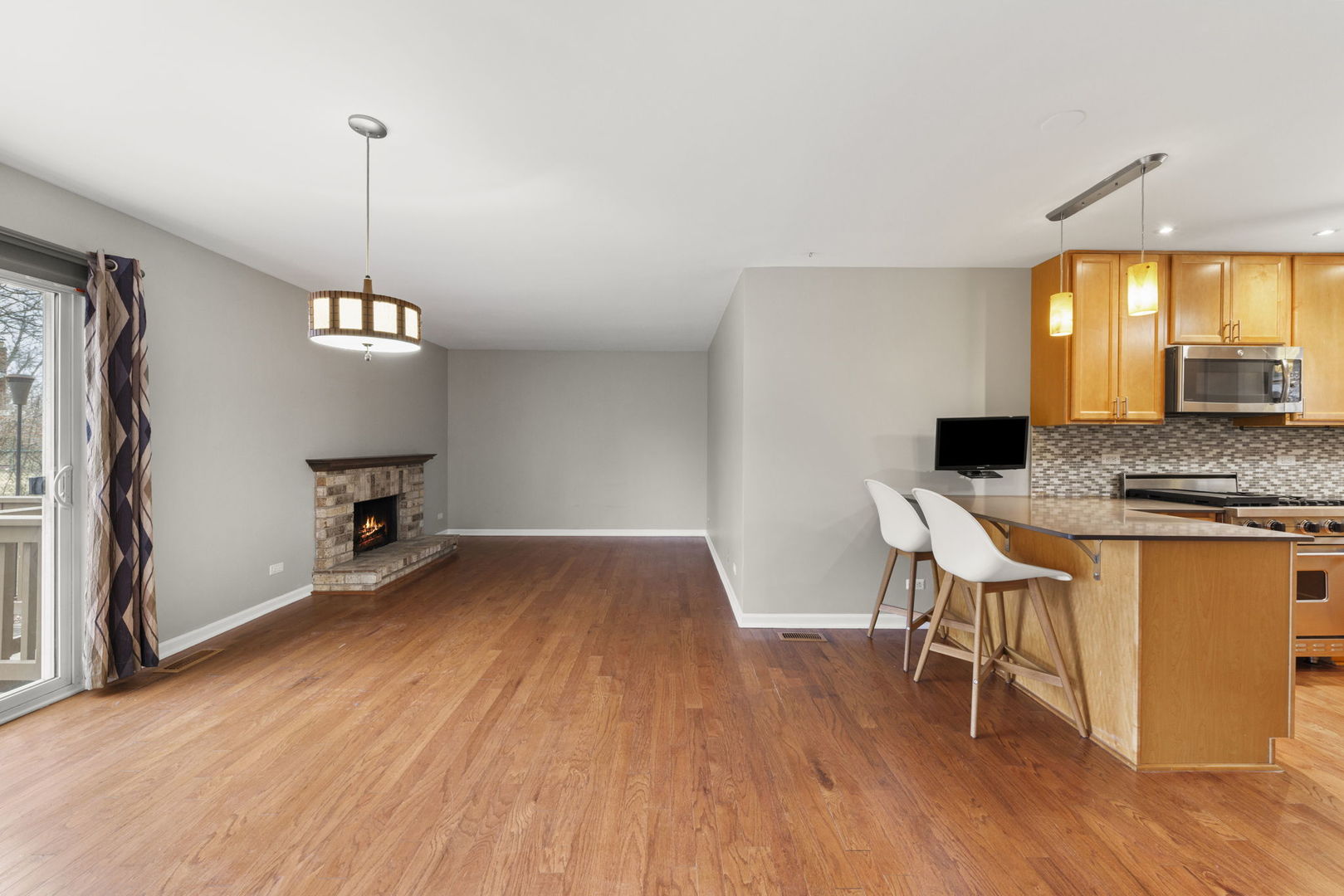 1263 Exeter Court Wheaton, IL 60189 - Photo 8 of 25 a view of a kitchen and dining room