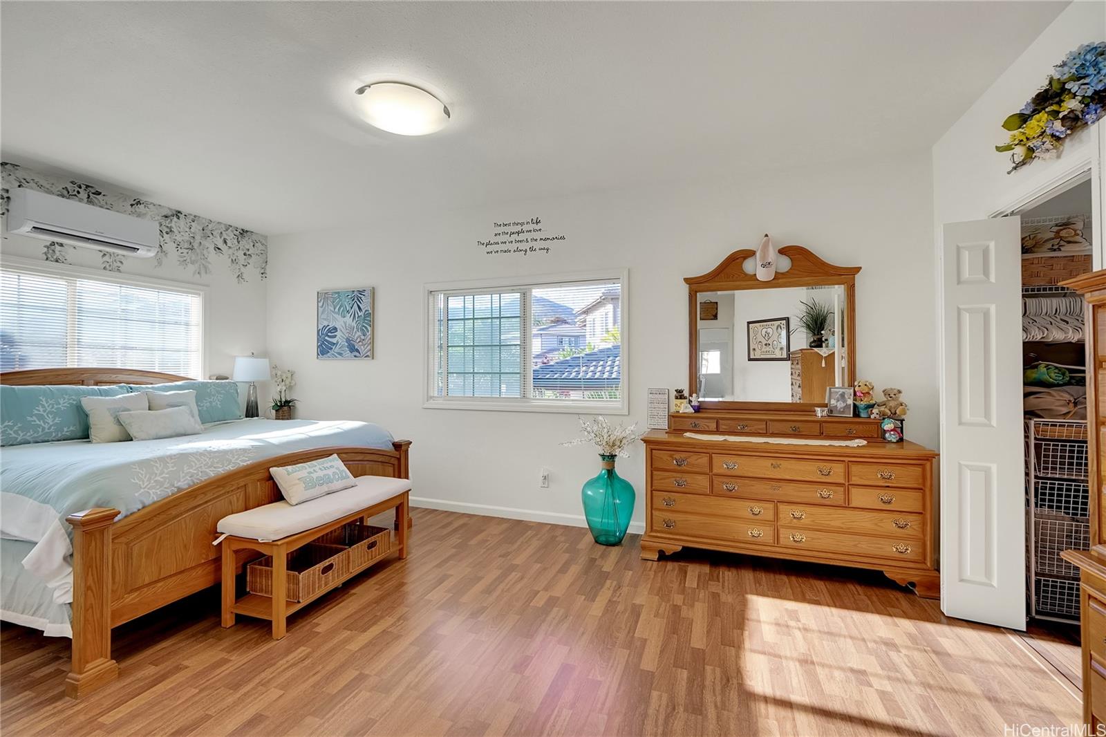 92-1306 Hauone Street Kapolei, HI 96707 - Photo 12 of 25 a bed room with a bed and a window