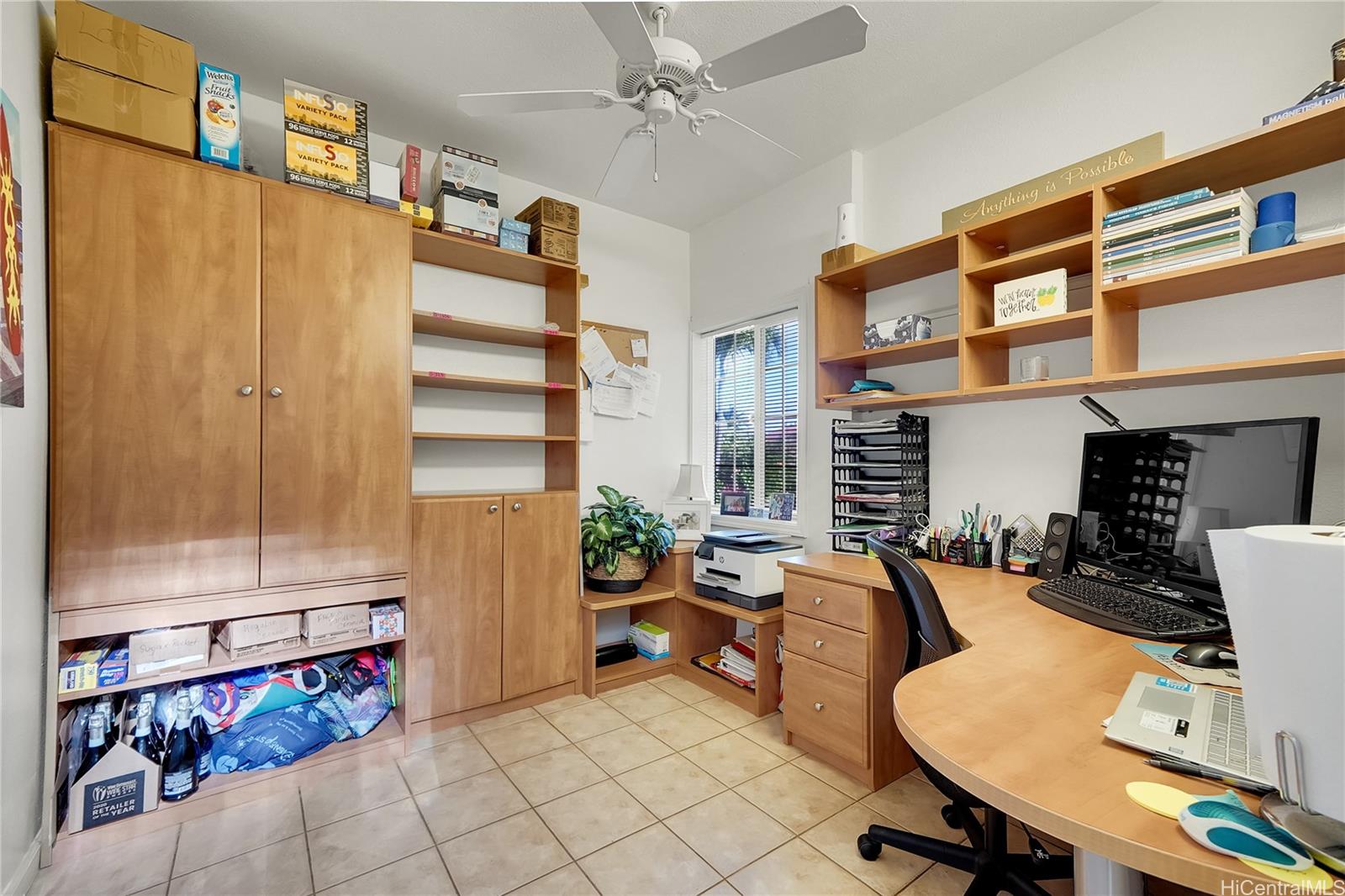 92-1306 Hauone Street Kapolei, HI 96707 - Photo 22 of 25 a living room with fireplace furniture and a window