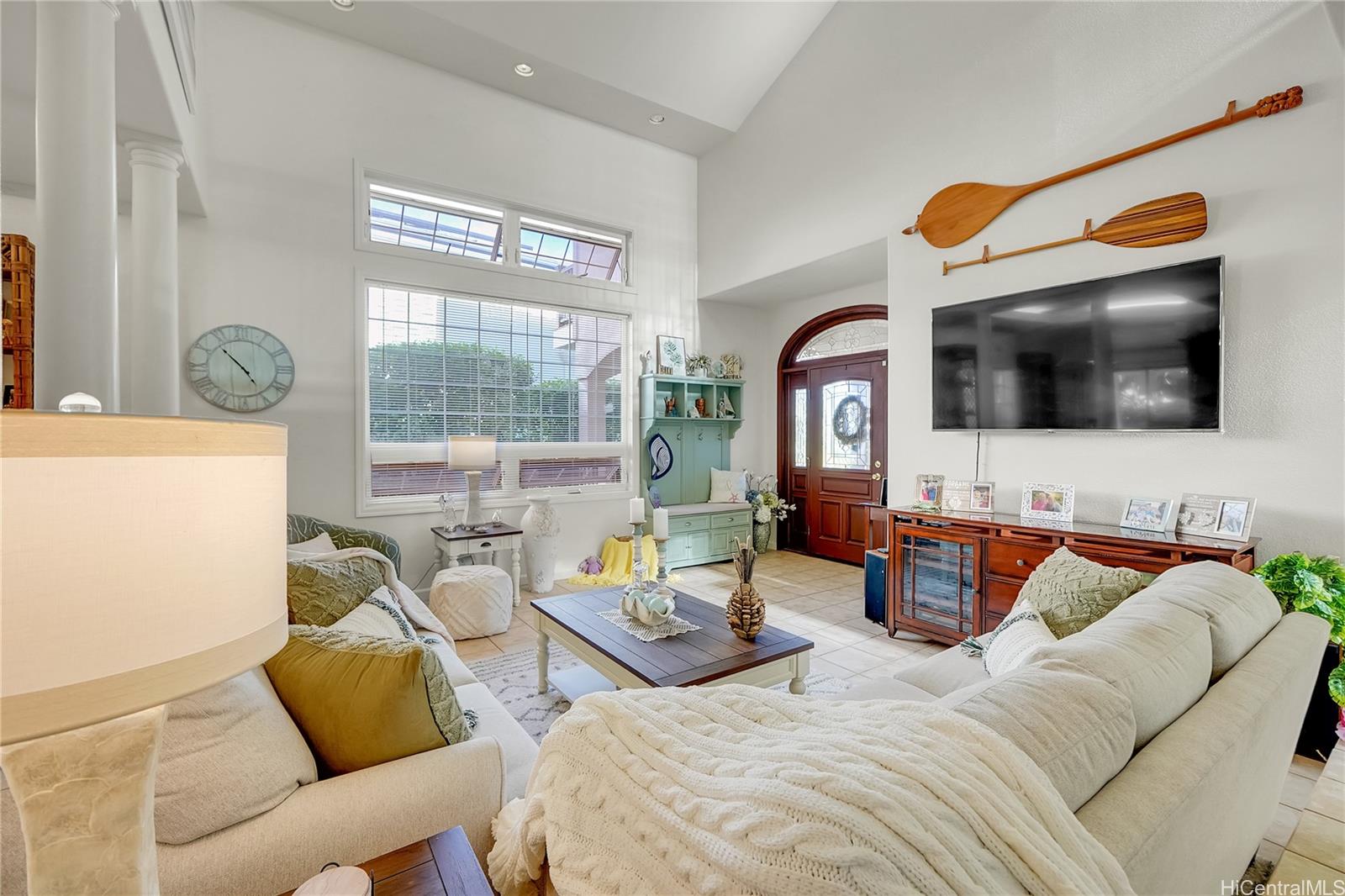 92-1306 Hauone Street Kapolei, HI 96707 - Photo 4 of 25 a living room with furniture and a flat screen tv