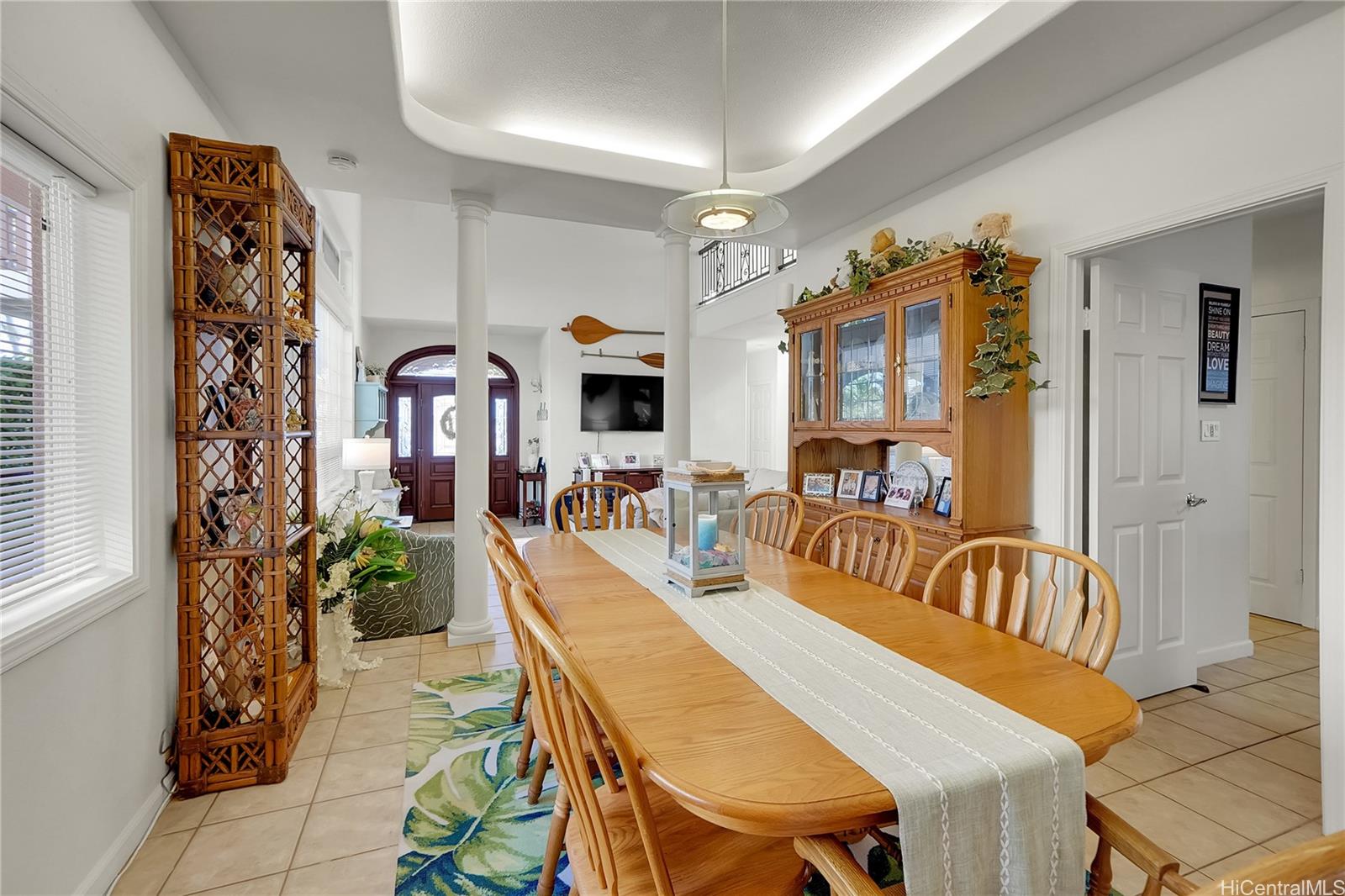 92-1306 Hauone Street Kapolei, HI 96707 - Photo 9 of 25 a dining room with furniture and window