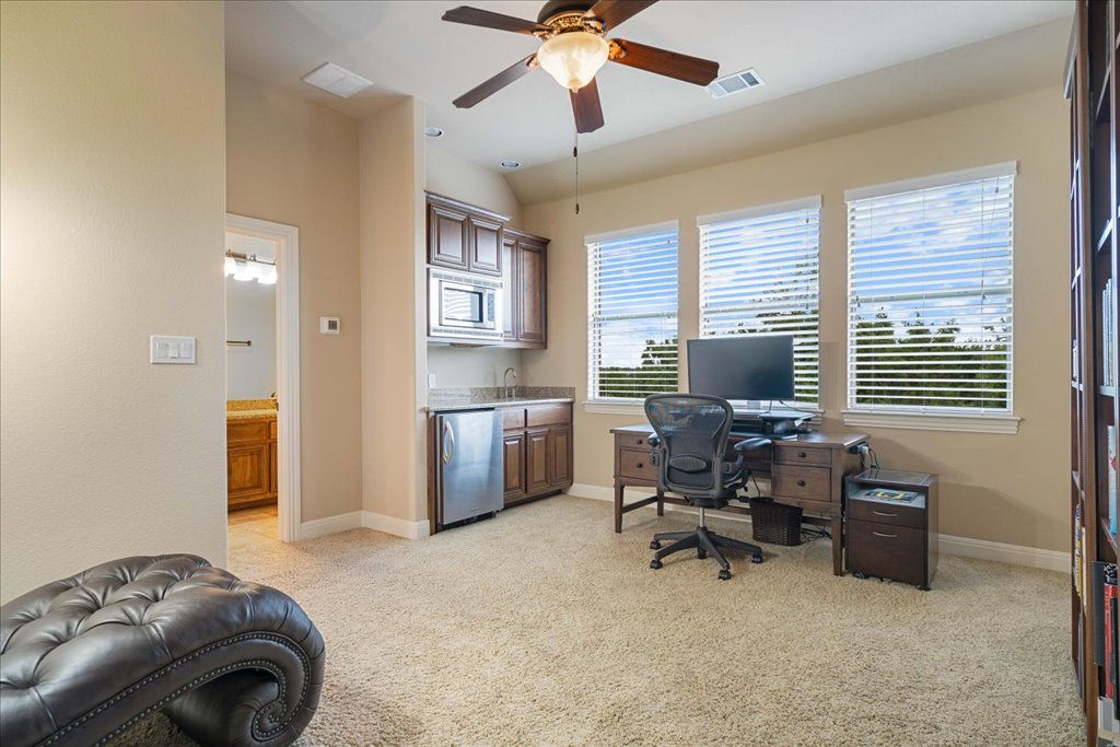 3920 Vail Divide Bee Cave, TX 78738 - Photo 24 of 34 a workspace with furniture and a window